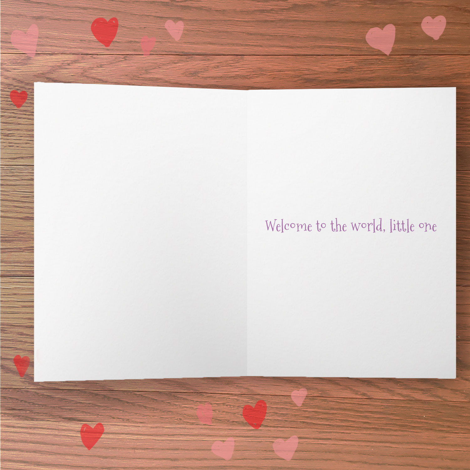 Inside of a greetings card with 'Welcome to the world little one' message.