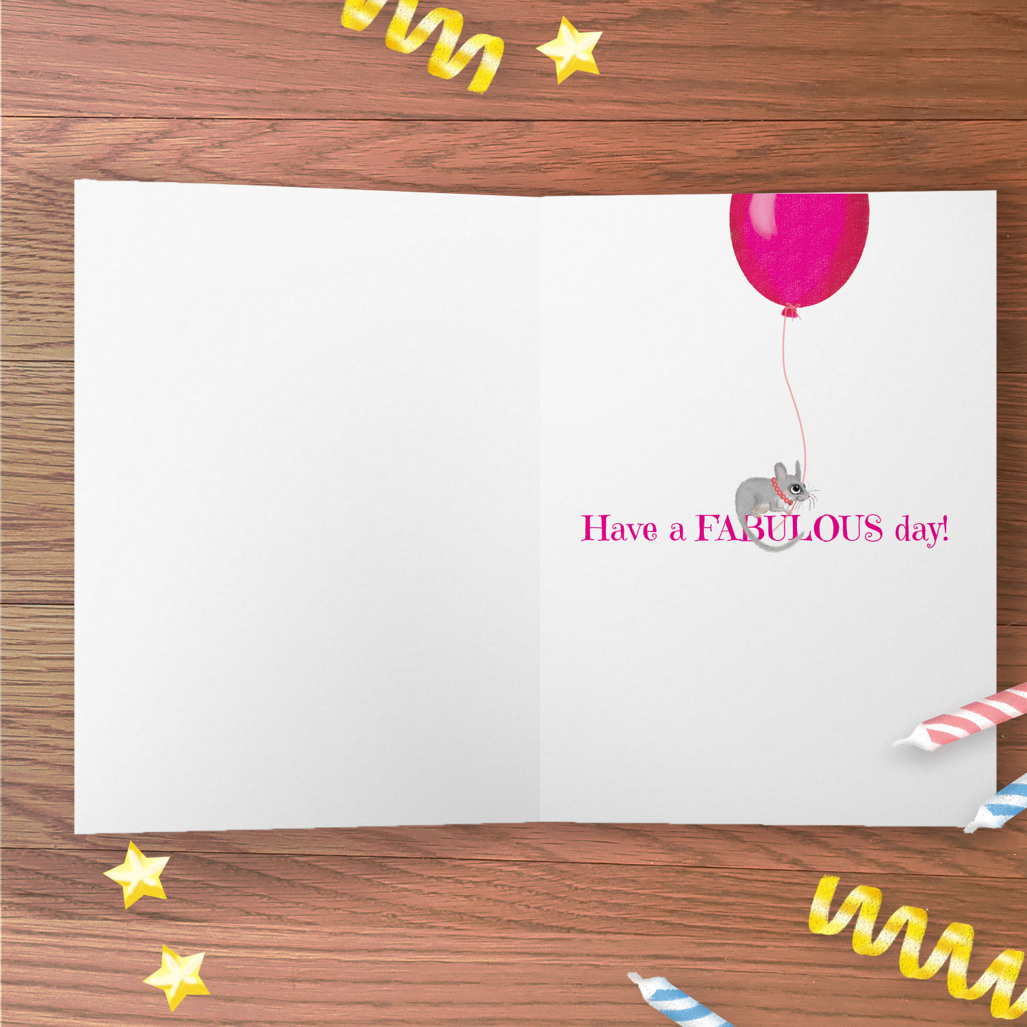Inside of a greetings card with 'Have a FABULOUS day!' and a mouse holding a pink balloon.