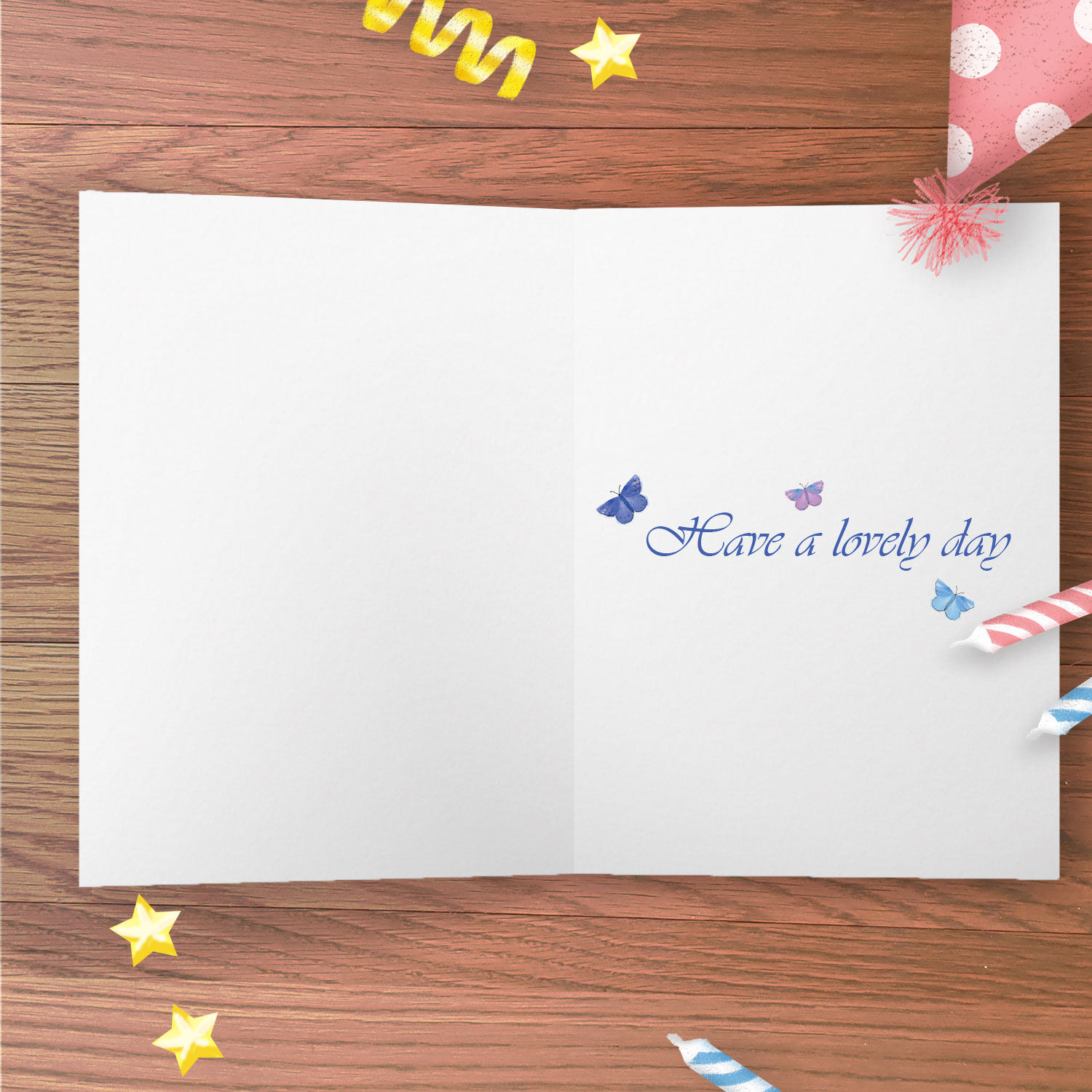 Inside of a greetings card with 'Have a lovely day' and 3 butterflies.