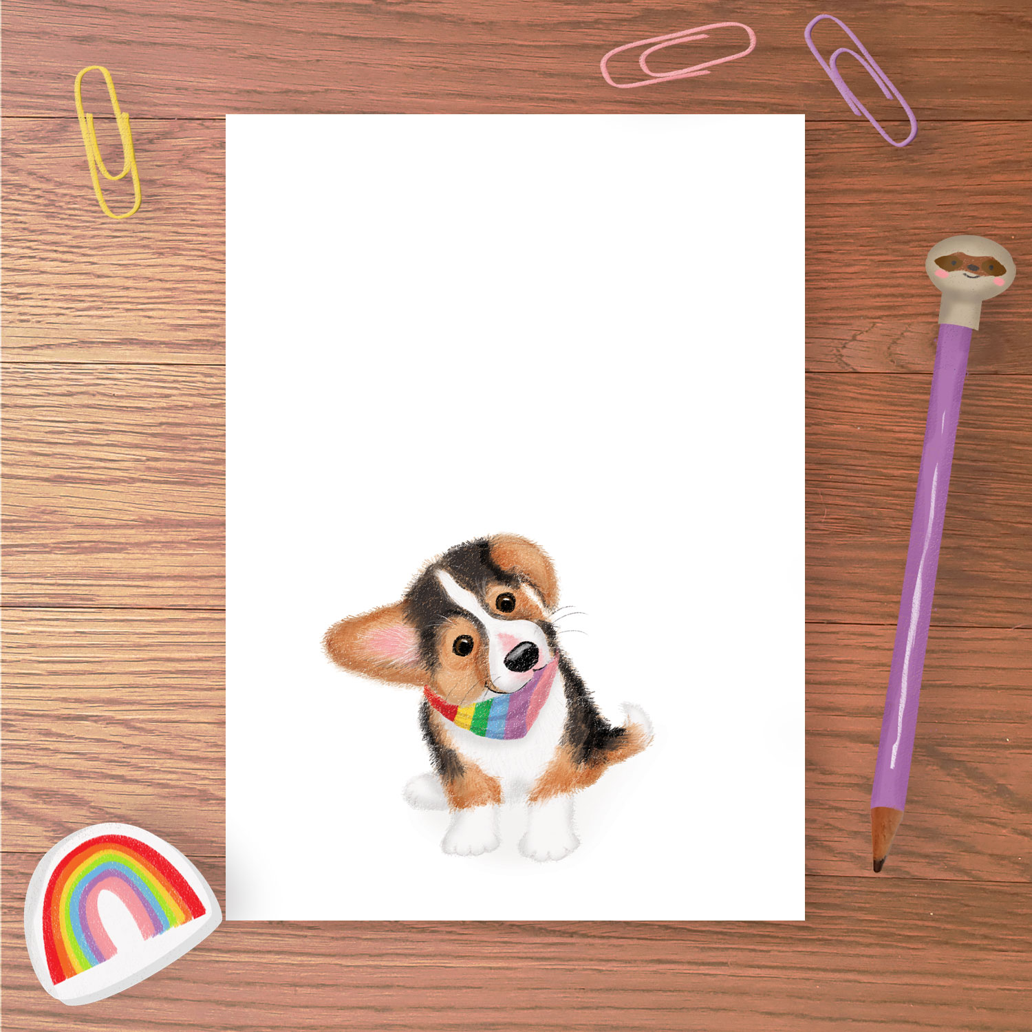 Greetings card with a cute corgi puppy wearing a rainbow bandana.