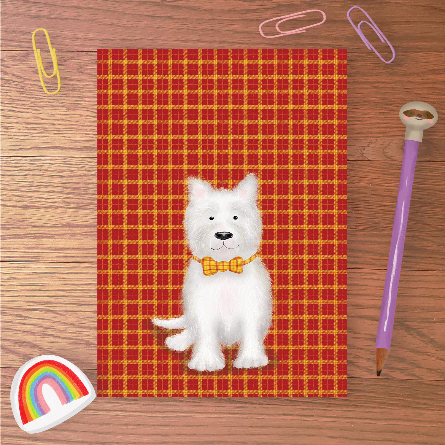 Greetings card with a West Highland terrier (Westie) dog wearing a tartan bowtie, on a tartan background.