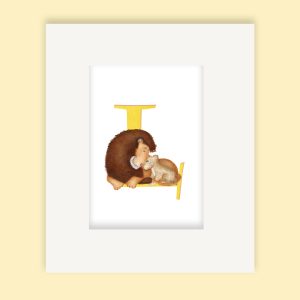 Mounted print hanging on the wall, of a yellow capital letter L with a cute father lion and cub pressing their noses together.