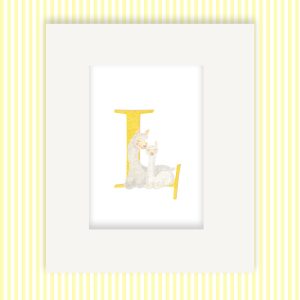 Mounted print hanging on the wall, of a capital letter L with a cute mother llama and baby cria.