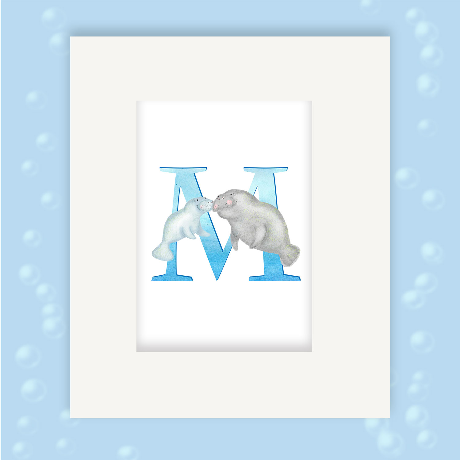 Mounted print hanging on the wall, of a blue capital letter M with a cute mother and baby manatee swimming together.