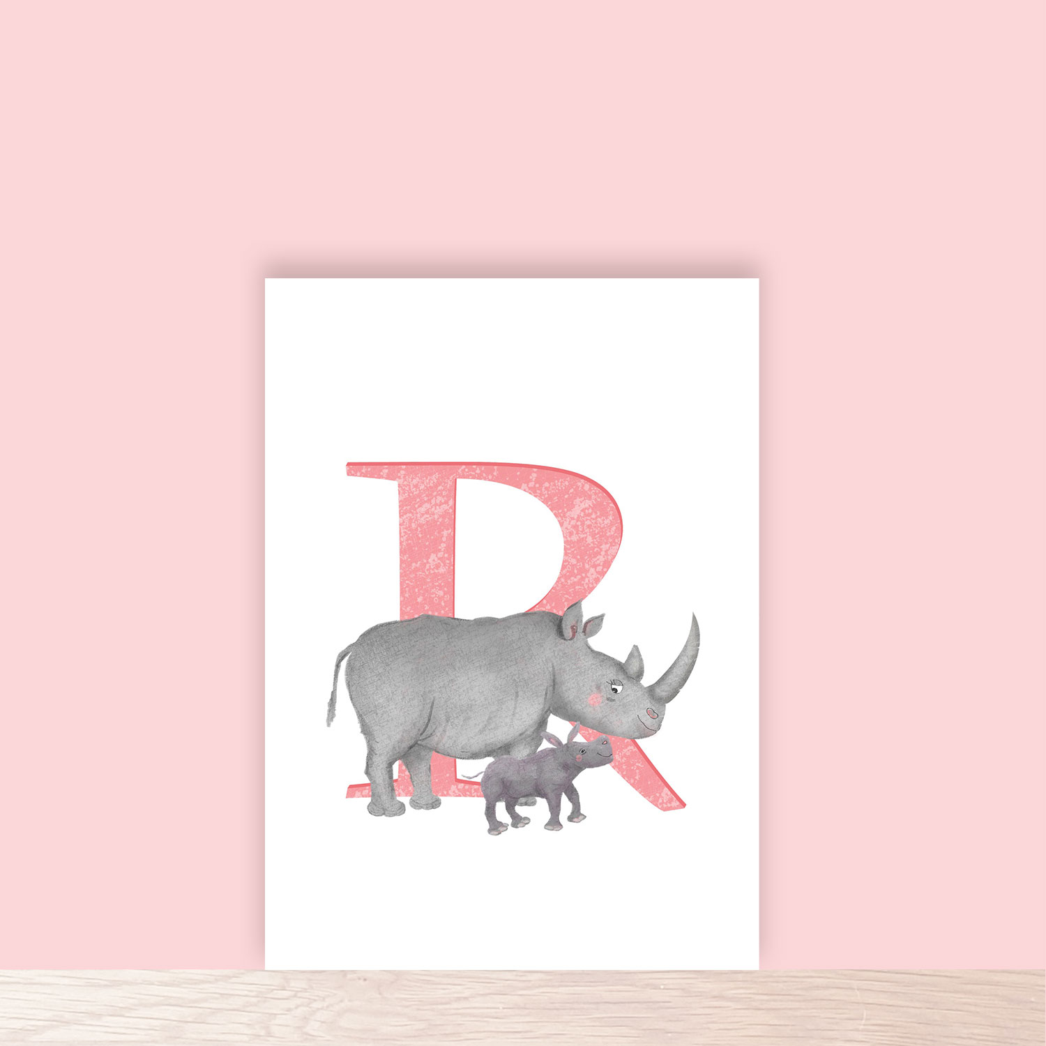 Pink capital letter R with a cute mother and baby rhino.