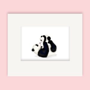 Mounted print hanging on a wall, of a cute mother and panda and cub.