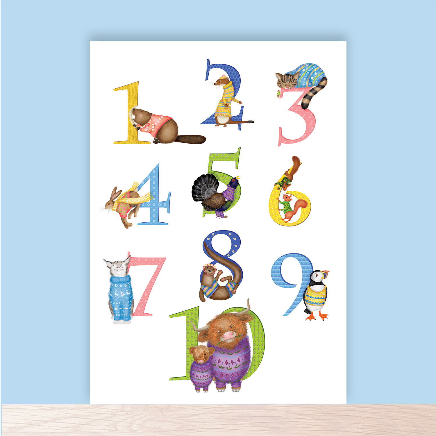 The numbers 1-10 illustrated with Scottish animals, including Highland cows and a puffin.