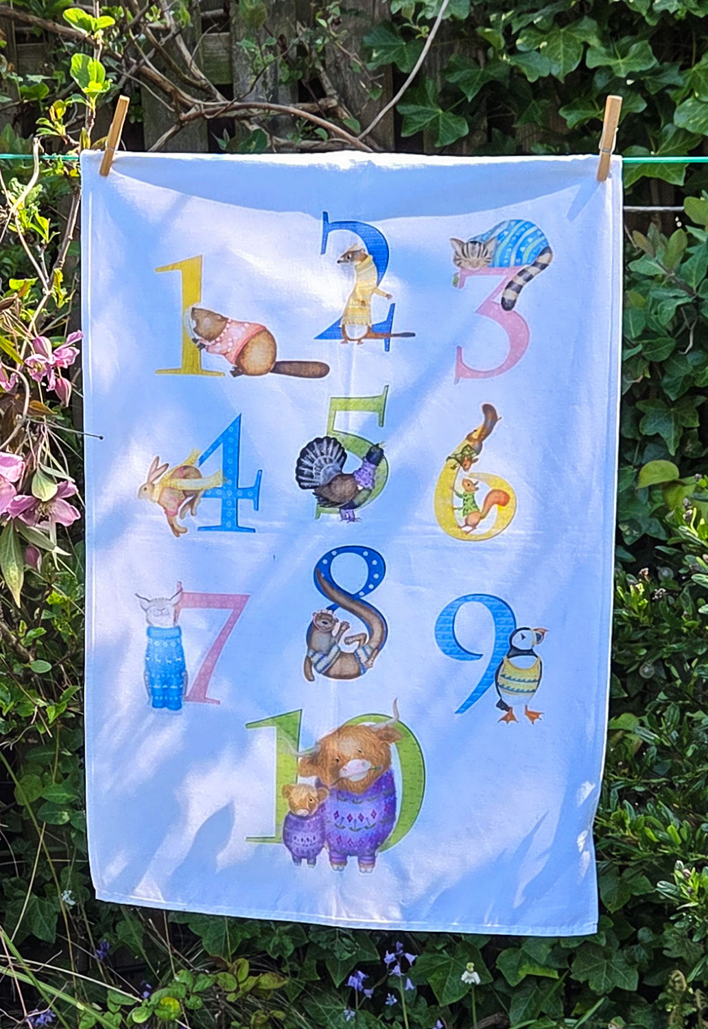 Tea towel with the numbers 1-10 illustrated with Scottish animals.
