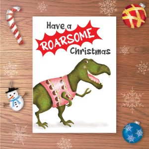 Greetings card with a T.rex dinosaur wearing a Christmas jumper, with Have a ROARSOME Christmas written above.
