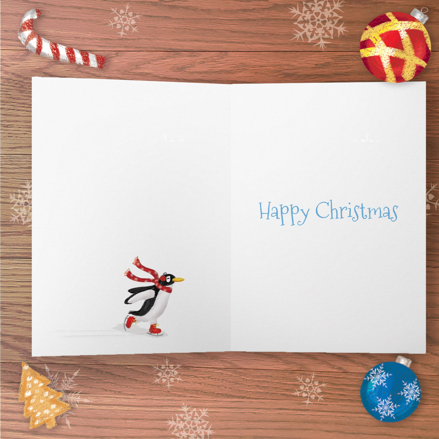 Inside of a greetings card with the text Happy Christmas and drawing of an ice skating penguin.