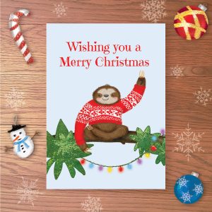 Christmas card with sloth on a branch, waving, wearing a red Christmas jumper and Wishing you a Merry Christmas written above.
