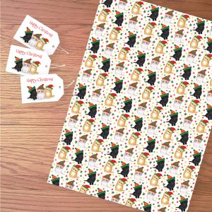 Sheet of Christmas kitten gift wrap and three matching gift tags.