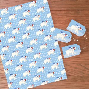 Sheet of Christmas wrapping paper with a polar bear and cub design, with three matching tags.