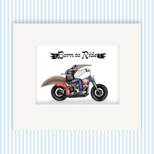 Print of a mother and baby anteater riding a vintage Harley Davidson, with Born to ride written above them. The print is mounted and hung on the wall.